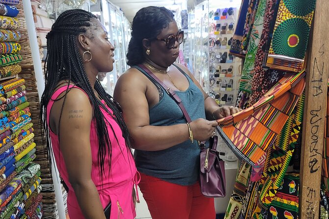 African custom clothing making experience with fabric tour - Learning measurements and cutting at the workshop