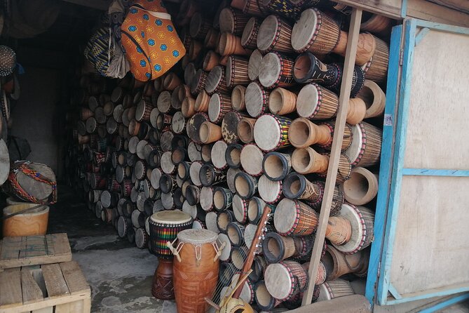 Half-Day Private African Drumming Lessons with Pick Up - The local market combines shopping with craft work