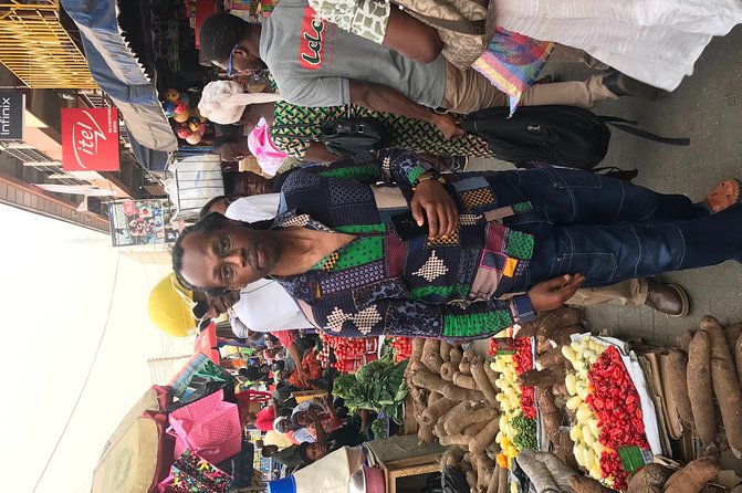 Kejetia Market Tour and Traditional Food Cooking Class. - Buying ingredients with local hosts