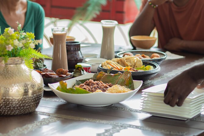 Private Full-Day Ghanaian Delicacy and Dessert Tour in Accra - Makola Market shows where the ingredients begin